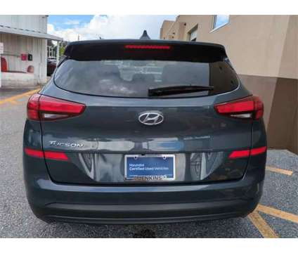 2021 Hyundai Tucson SE is a Blue 2021 Hyundai Tucson SE SUV in Ocala FL