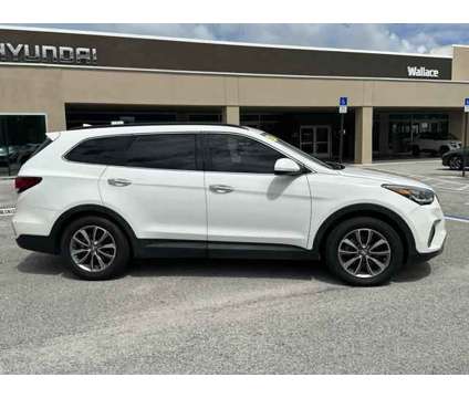 2017 Hyundai Santa Fe SE is a White 2017 Hyundai Santa Fe SE SUV in Stuart FL