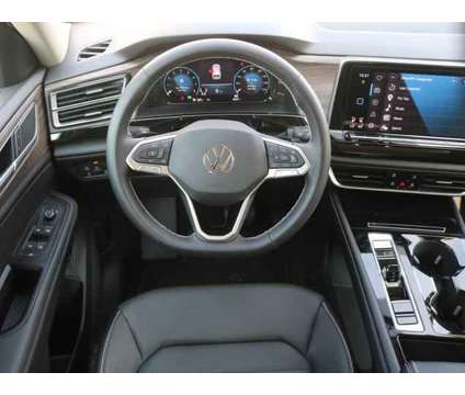 2024 Volkswagen Atlas 2.0T SEL is a White 2024 Volkswagen Atlas 2.0T SEL SUV in Lansing MI