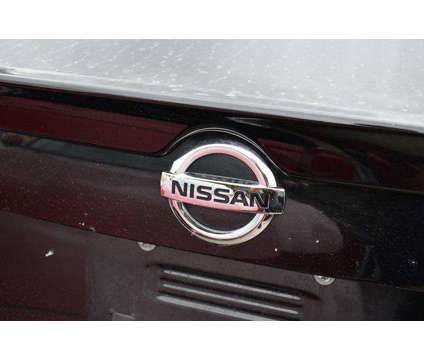 2021 Nissan Sentra SR Xtronic CVT is a Black 2021 Nissan Sentra SR Sedan in Lawrence KS