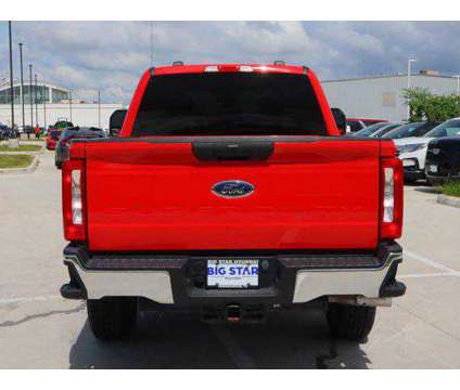 2023 Ford F-250 XLT is a Red 2023 Ford F-250 XLT Truck in Friendswood TX