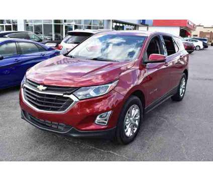 2018 Chevrolet Equinox LT is a Red 2018 Chevrolet Equinox LT SUV in Lawrence KS