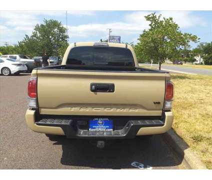 2020 Toyota Tacoma SR5 V6 is a Tan 2020 Toyota Tacoma SR5 Car for Sale in Fredericksburg VA