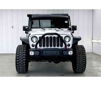 2016 Jeep Wrangler Unlimited Rubicon Hard Rock is a White 2016 Jeep Wrangler Unlimited Rubicon SUV in Madison WI