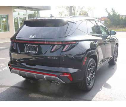 2024 Hyundai Tucson Hybrid N Line is a Black 2024 Hyundai Tucson Hybrid in Lansing MI