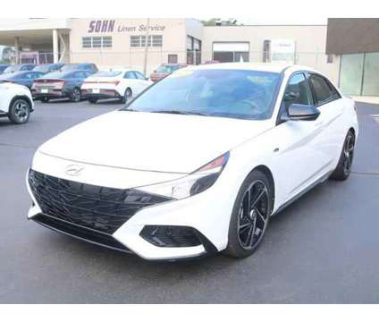 2023 Hyundai Elantra N Line is a White 2023 Hyundai Elantra Sedan in Lansing MI