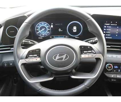 2024 Hyundai Elantra SEL is a White 2024 Hyundai Elantra Sedan in Lansing MI