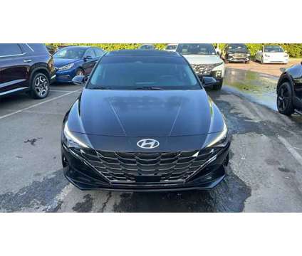 2023 Hyundai Elantra Hybrid Limited is a Black 2023 Hyundai Elantra Hybrid in Cumming GA