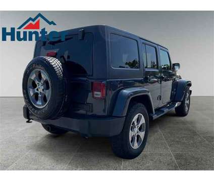 2017 Jeep Wrangler Unlimited Sahara 4x4 is a 2017 Jeep Wrangler Unlimited Sahara SUV in Fletcher NC