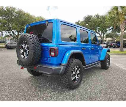 2021 Jeep Wrangler Unlimited Rubicon is a Blue 2021 Jeep Wrangler Unlimited Car for Sale in Orlando FL