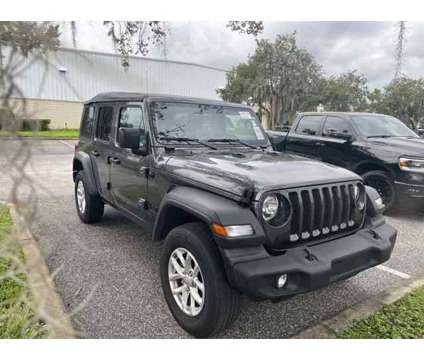 2023 Jeep Wrangler Sport S is a Grey 2023 Jeep Wrangler Sport Car for Sale in Orlando FL