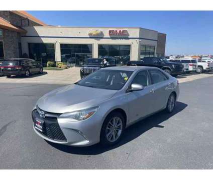 2015 Toyota Camry Hybrid SE is a Silver 2015 Toyota Camry Hybrid SE Hybrid in Logan UT