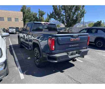 2020 GMC Sierra 2500HD 4WD Crew Cab Standard Bed AT4 is a Blue 2020 GMC Sierra 2500 H/D Truck in Logan UT