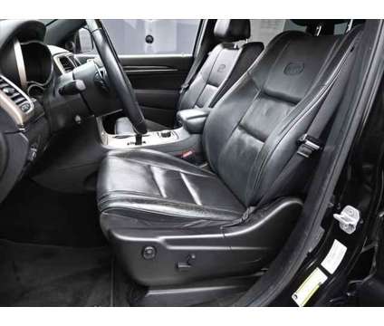 2014 Jeep Grand Cherokee Overland is a Black 2014 Jeep grand cherokee Overland SUV in Dubuque IA