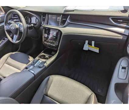 2024 Infiniti QX50 LUXE is a White 2024 Infiniti QX50 Luxe Station Wagon in Peoria AZ