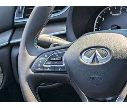 2024 Infiniti QX50 LUXE is a White 2024 Infiniti QX50 Luxe Station Wagon in Peoria AZ