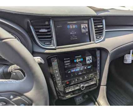 2024 Infiniti QX50 LUXE is a White 2024 Infiniti QX50 Luxe Station Wagon in Peoria AZ