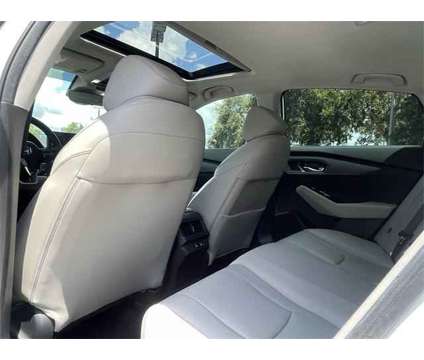 2023 Honda Accord Hybrid Touring is a Silver, White 2023 Honda Accord Hybrid in Leesburg FL