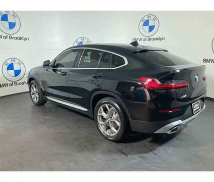 2022 BMW X4 xDrive30i is a Black 2022 BMW X4 xDrive30i SUV in Brooklyn NY