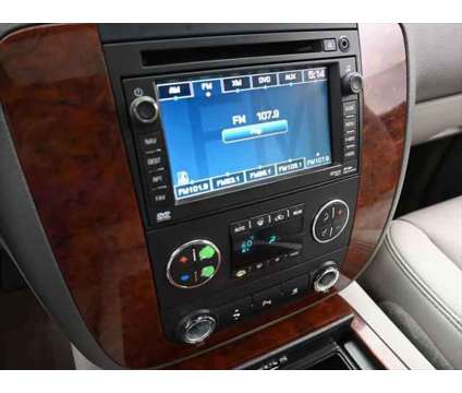 2010 Chevrolet Tahoe LTZ is a White 2010 Chevrolet Tahoe LTZ SUV in Dubuque IA