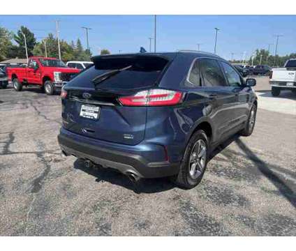 2019 Ford Edge SEL is a Blue 2019 Ford Edge SEL SUV in Stevens Point WI