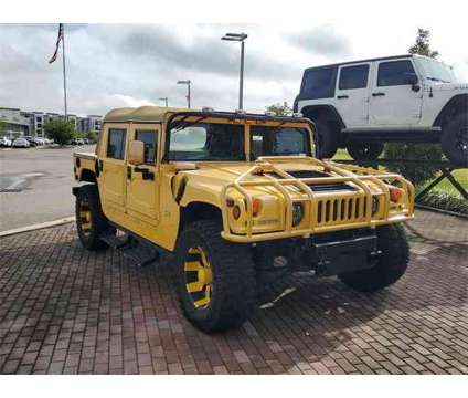 1999 Hummer H1 Wagon is a Yellow 1999 Hummer H1 Wagon SUV in Pinellas Park FL