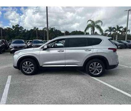 2019 Hyundai Santa Fe SEL Plus is a Silver 2019 Hyundai Santa Fe SE SUV in Stuart FL