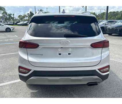 2019 Hyundai Santa Fe SEL Plus is a Silver 2019 Hyundai Santa Fe SE SUV in Stuart FL