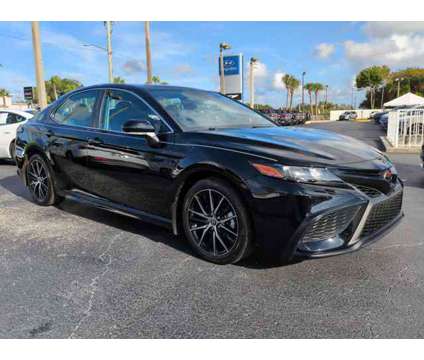 2022 Toyota Camry SE is a Black 2022 Toyota Camry SE Sedan in Daytona Beach FL