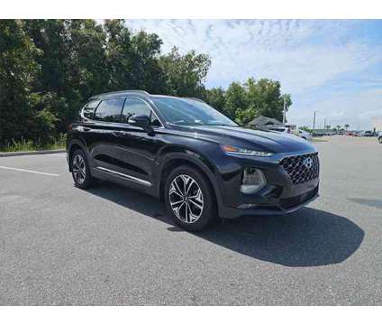 2019 Hyundai Santa Fe Ultimate 2.0T is a Black 2019 Hyundai Santa Fe SUV in Leesburg FL