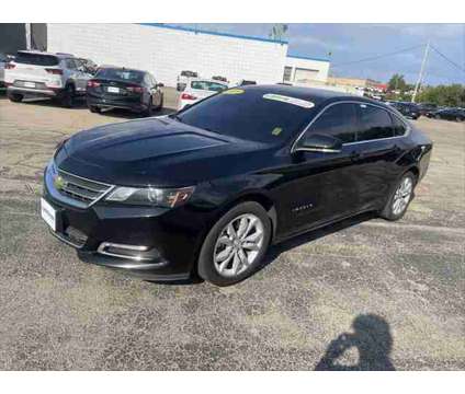 2019 Chevrolet Impala LT is a Black 2019 Chevrolet Impala LT Sedan in Dubuque IA