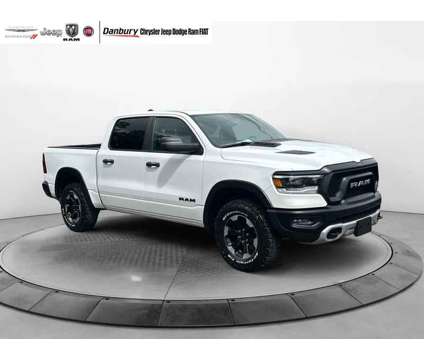 2021UsedRamUsed1500Used4x4 Crew Cab 57 Box is a White 2021 RAM 1500 Model Car for Sale in Danbury CT