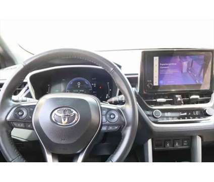 2023 Toyota Corolla Cross Hybrid XSE is a Red 2023 Toyota Corolla Hybrid in Libertyville IL