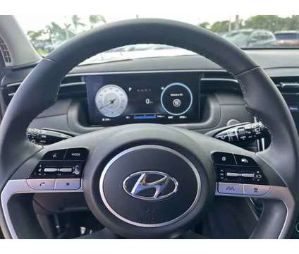 2023 Hyundai Tucson SEL is a Red 2023 Hyundai Tucson SE SUV in Stuart FL