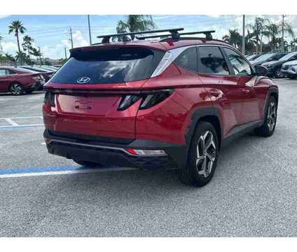 2023 Hyundai Tucson SEL is a Red 2023 Hyundai Tucson SE SUV in Stuart FL