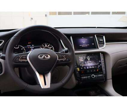 2024 Infiniti QX50 LUXE AWD is a White 2024 Infiniti QX50 Luxe Station Wagon in Libertyville IL