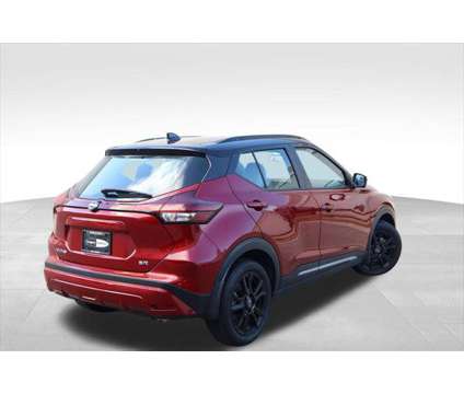 2023 Nissan Kicks SR Xtronic CVT is a Black, Red 2023 Nissan Kicks SR Station Wagon in Libertyville IL