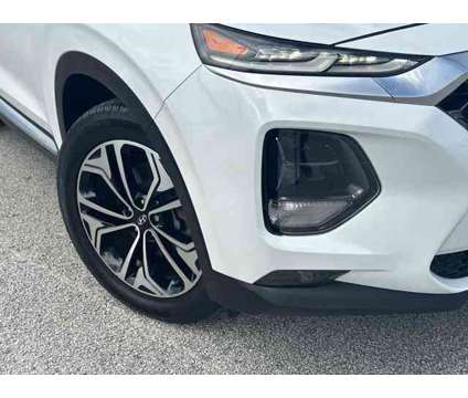 2019 Hyundai Santa Fe Limited 2.0T is a White 2019 Hyundai Santa Fe Limited SUV in Stuart FL