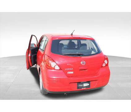 2011 Nissan Versa 1.8S is a Red 2011 Nissan Versa 1.8 S Hatchback in Libertyville IL