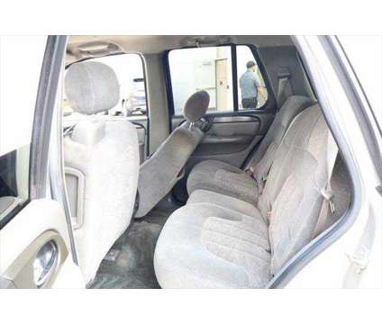 2004 GMC Envoy SLE is a Tan 2004 GMC Envoy SLE SUV in Libertyville IL