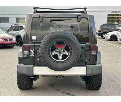 2012 Jeep Wrangler Sahara is a White 2012 Jeep Wrangler Sahara SUV in Pittsburgh PA