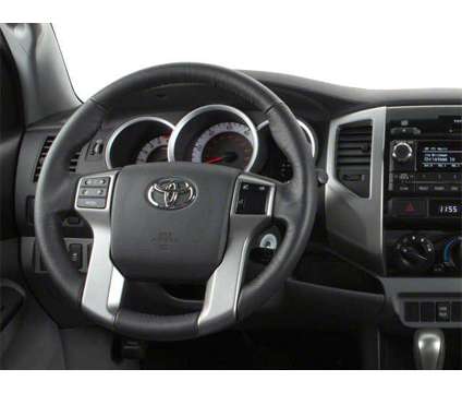 2012 Toyota Tacoma Base is a White 2012 Toyota Tacoma Base Car for Sale in Triadelphia WV