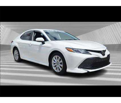 2019 Toyota Camry L is a White 2019 Toyota Camry L Sedan in Fort Lauderdale FL