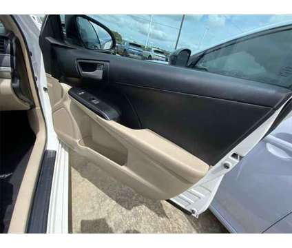 2014 Toyota Camry L is a White 2014 Toyota Camry L Sedan in Rosenberg TX