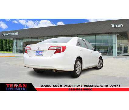 2014 Toyota Camry L is a White 2014 Toyota Camry L Sedan in Rosenberg TX