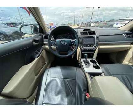 2014 Toyota Camry L is a White 2014 Toyota Camry L Sedan in Rosenberg TX