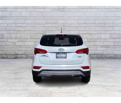 2018 Hyundai Santa Fe Sport 2.4L is a White 2018 Hyundai Santa Fe Sport 2.4L SUV in Longmont CO