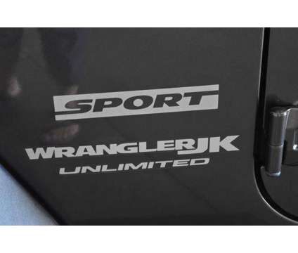 2018 Jeep Wrangler JK Unlimited Sport S 4x4 is a Grey 2018 Jeep Wrangler SUV in Manhattan KS