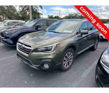 2019 Subaru Outback 2.5i Touring is a Green 2019 Subaru Outback 2.5i Station Wagon in Orlando FL