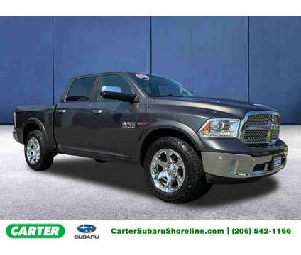 2018 RAM 1500 Gray, 107K miles is a Grey 2018 RAM 1500 Model Laramie Truck in Seattle WA